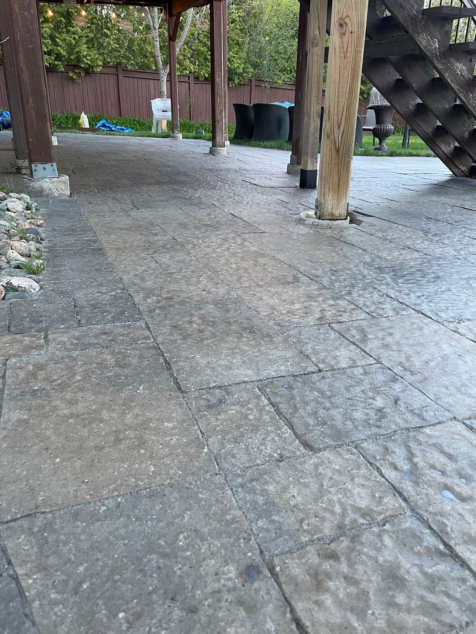 Stamped concrete patio under pergola